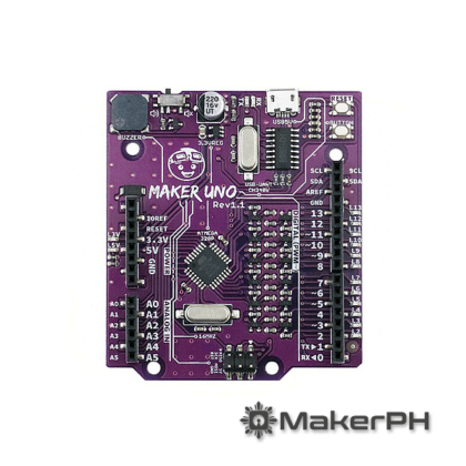 Purple Maker Uno microcontroller board with components