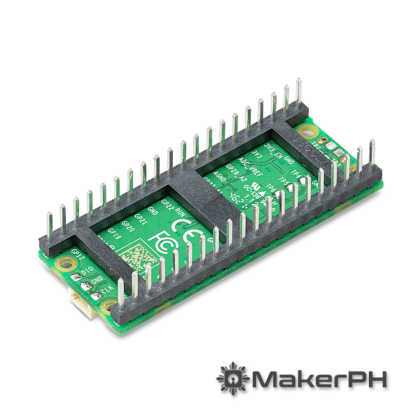 Green microcontroller board with pins and maker logo.