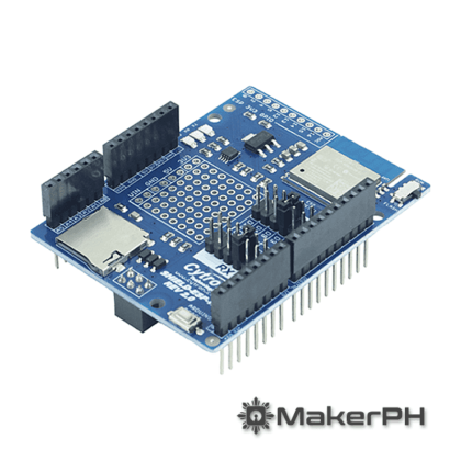 Blue microcontroller development board with pins and slots.