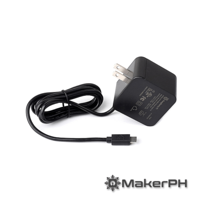 Black power adapter with USB-C connector