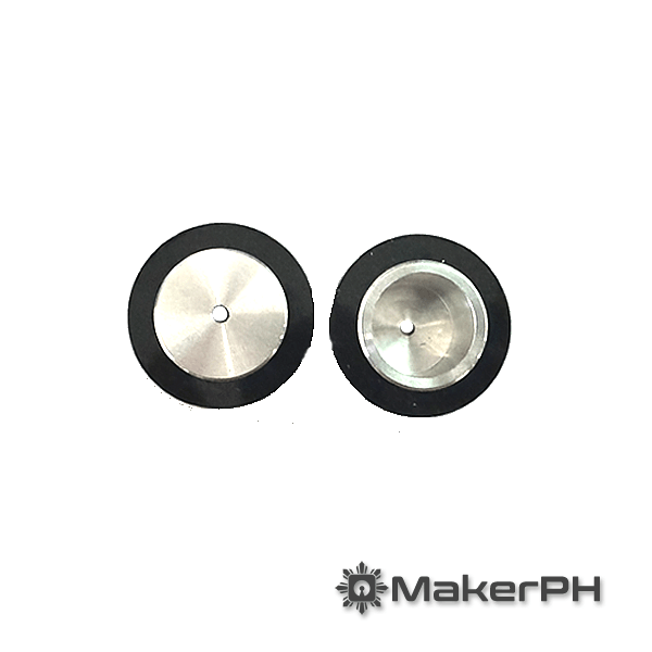 Two black and silver ultrasonic atomizer discs.